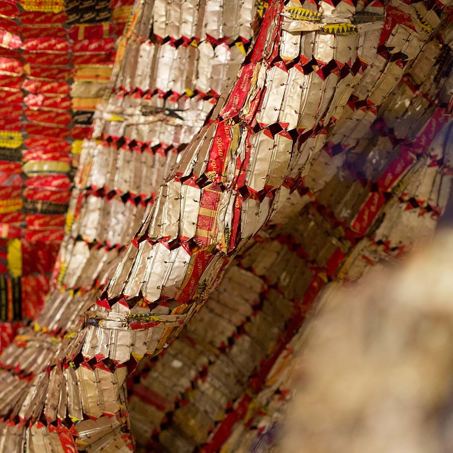 <strong>El Anatsui</strong>, <em>AG + BA</em> (detail), 2014. <br>Aluminium, copper wire and nylon rope, Dimensions variable.
