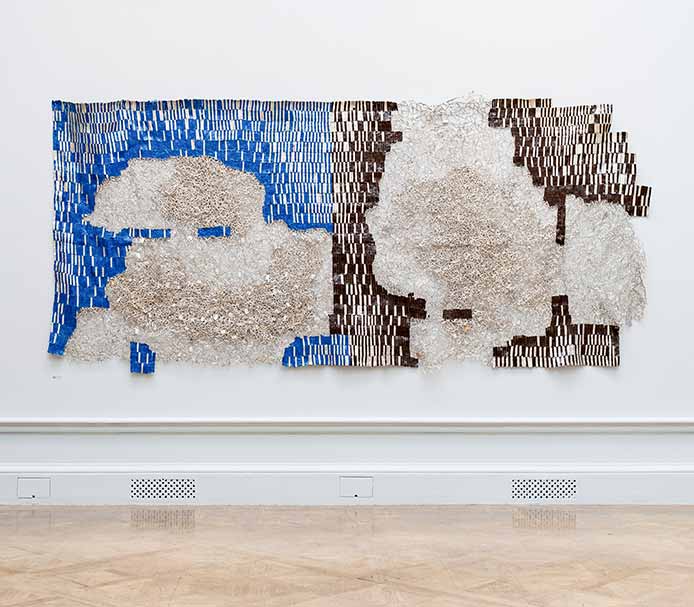 El Anatsui, Continents in Gestation, 2024. Aluminium and copper wire, 240 x 530 cm. 