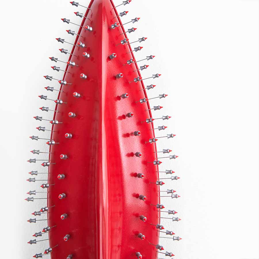 <strong>LR Vandy</strong>, <em>Red Dart</em> (detail), 2019. Metal and plastic, 40 x 16 x 15 cm.