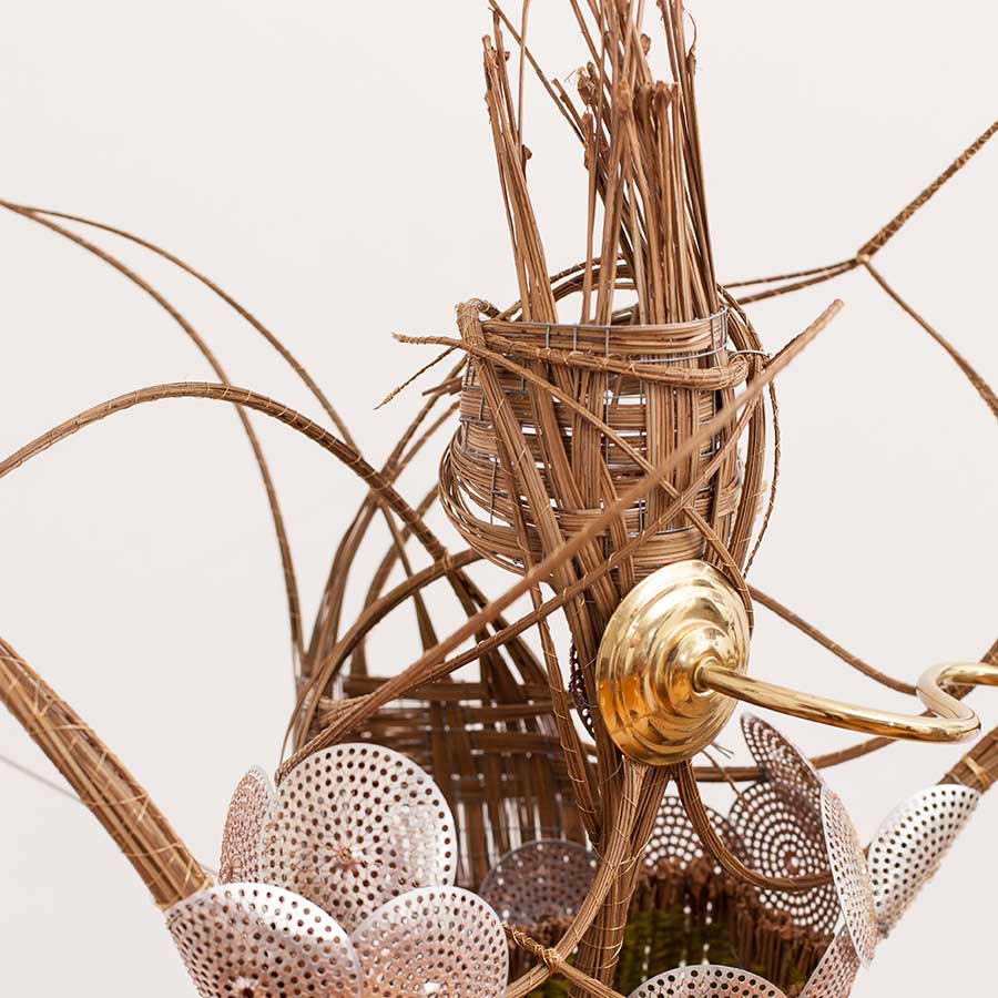 <strong>Adejoke Tugbiyele</strong>, <em>Flight of Revelation</em>, 2011.
Palm stems, steel wire, trivet and mannequin head, 183 x 152 x 91 cm.