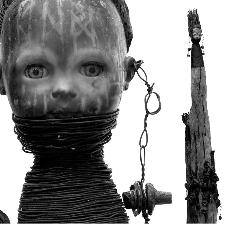 <strong>Gérard Quenum</strong>, <em>Femmes Peul</em>, 2007.<br>Wood, doll, wire, hardware, 203 x 37 x 16 cm.